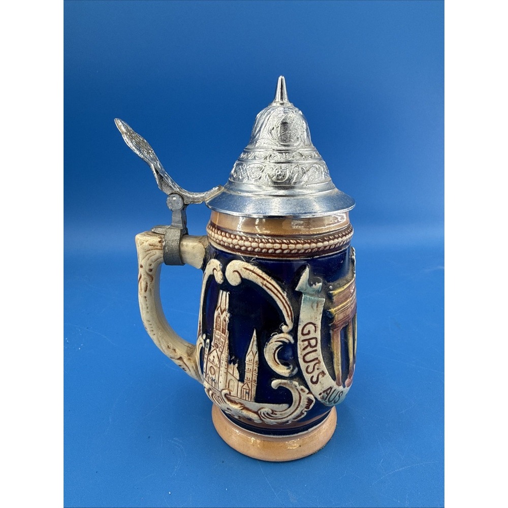 Vtg German relief ceramic souvenir beer stein w/ hinged pewter-tone metal lid,